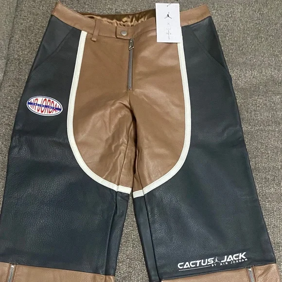 Never worn with tags- Jordan x Travis Scott Leather Pants (Size 4)
